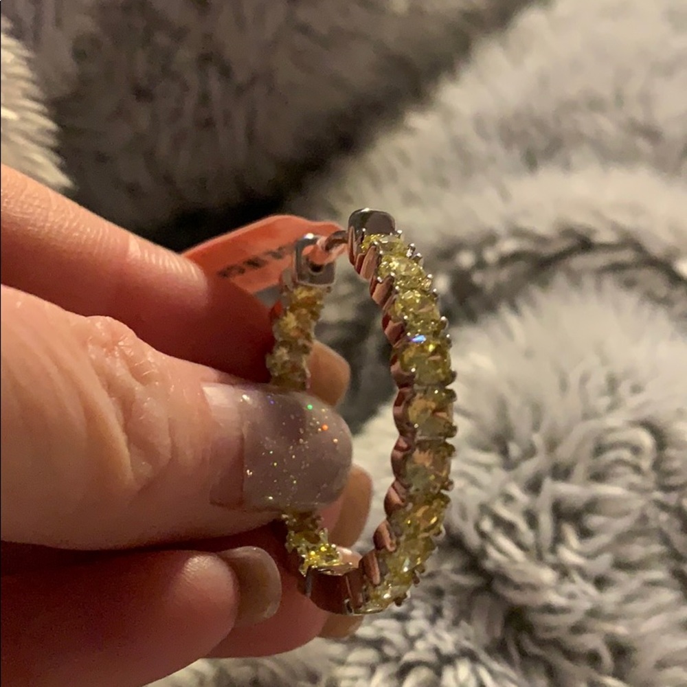 Sparkly simulated yellow diamond hoop earrings.